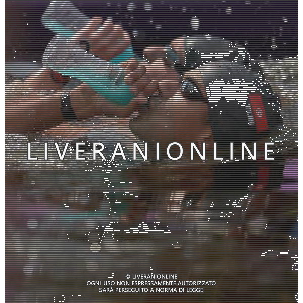 (120810) -- LONDON, Aug. 10, 2012 () -- Oussama Mellouli of Tunisia takes part in men\'s swimming 10km marathon, at London 2012 Olympic Games in London, Britain, on August 10, 2012. Oussama Mellouli of Tunisia won gold medal. (/Chen Xiaowei) (nxl) ITALY ONLY - GIOCHI OLIMPICI, OLIMPIADI LONDRA 2012