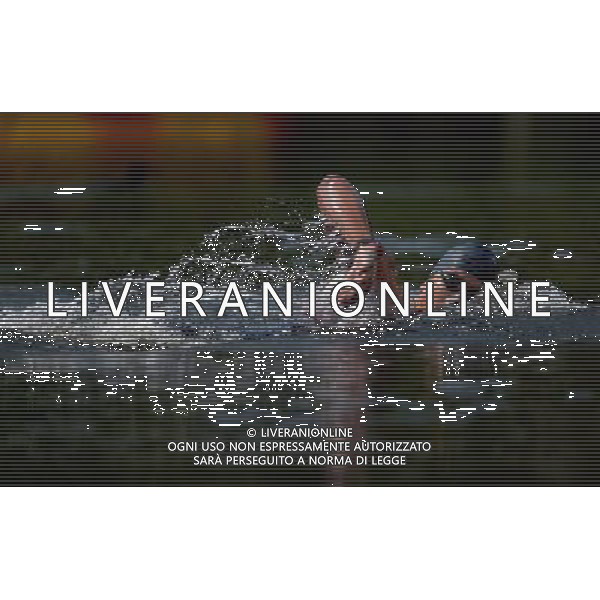 (120810) -- LONDON, Aug. 10, 2012 () -- Oussama Mellouli of Tunisia takes part in men\'s swimming 10km marathon, at London 2012 Olympic Games in London, Britain, on August 10, 2012. Oussama Mellouli of Tunisia won gold medal. (/Chen Xiaowei) (nxl) ITALY ONLY - GIOCHI OLIMPICI, OLIMPIADI LONDRA 2012