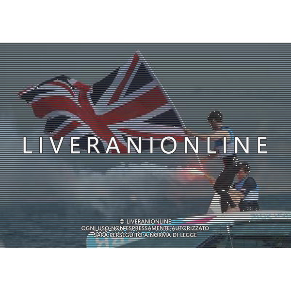 (120810) -- WEYMOUTH, Aug. 10, 2012 () -- Luke Patience (L)/Stuart Bithell of Britain celebrate after 470 men competition of sailing event, at London 2012 Olympic Games in Weymouth and Portland, Britain, August 10, 2012. Mathew Belcher/Malcolm Page of Australia won gold medal. Luke Patience/Stuart Bithell of Britain won silve medal. (/Zeng Yi) (zgp) ITALY ONLY - GIOCHI OLIMPICI, OLIMPIADI LONDRA 2012