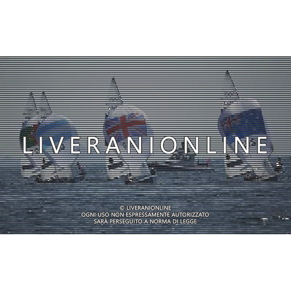 (120810) -- WEYMOUTH, Aug. 10, 2012 () -- Mathew Belcher/Malcolm Page (R) of Australia and Luke Patience/Stuart Bithell (C) of Britain compete in 470 men competition of sailing event, at London 2012 Olympic Games in Weymouth and Portland, Britain, August 10, 2012. Mathew Belcher/Malcolm Page of Australia won gold medal. Luke Patience/Stuart Bithell of Britain won silver medal. (/Fei Moahua) (zgp) ITALY ONLY - GIOCHI OLIMPICI, OLIMPIADI LONDRA 2012