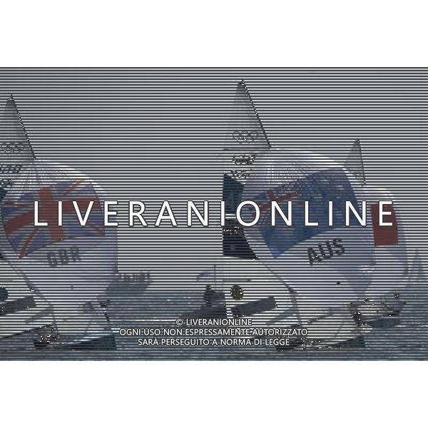 (120810) -- WEYMOUTH, Aug. 10, 2012 () -- Mathew Belcher/Malcolm Page (R) of Australia and Luke Patience/Stuart Bithell of Britain compete in 470 men competition of sailing event, at London 2012 Olympic Games in Weymouth and Portland, Britain, August 10, 2012. Mathew Belcher/Malcolm Page of Australia won gold medal. Luke Patience/Stuart Bithell of Britain won silver medal. (/Fei Moahua) (zgp) ITALY ONLY - GIOCHI OLIMPICI, OLIMPIADI LONDRA 2012