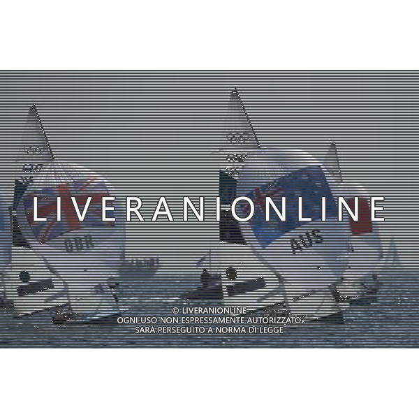 (120810) -- WEYMOUTH, Aug. 10, 2012 () -- Mathew Belcher/Malcolm Page (R) of Australia and Luke Patience/Stuart Bithell of Britain compete in 470 men competition of sailing event, at London 2012 Olympic Games in Weymouth and Portland, Britain, August 10, 2012. Mathew Belcher/Malcolm Page of Australia won gold medal. Luke Patience/Stuart Bithell of Britain won silver medal. (/Fei Moahua) (zgp) ITALY ONLY - GIOCHI OLIMPICI, OLIMPIADI LONDRA 2012