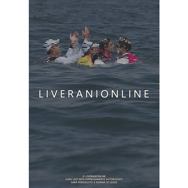 (120810) -- WEYMOUTH, Aug. 10, 2012 () -- Australian and British athletes celebrate after competing in 470 men competition of sailing event, at London 2012 Olympic Games in Weymouth and Portland, Britain, August 10, 2012. Austrlian and British team won gold and sivler medal in this event. (/Fei Moahua) (zgp) ITALY ONLY - GIOCHI OLIMPICI, OLIMPIADI LONDRA 2012