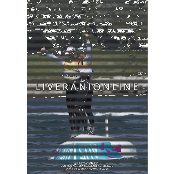 (120810) -- WEYMOUTH, Aug. 10, 2012 () -- Mathew Belcher (R)/Malcolm Page of Australia celebrate after competing in 470 men competition of sailing event, at London 2012 Olympic Games in Weymouth and Portland, Britain, August 10, 2012. Mathew Belcher/Malcolm Page of Australia won gold medal. (/Fei Moahua) (zgp) ITALY ONLY - GIOCHI OLIMPICI, OLIMPIADI LONDRA 2012