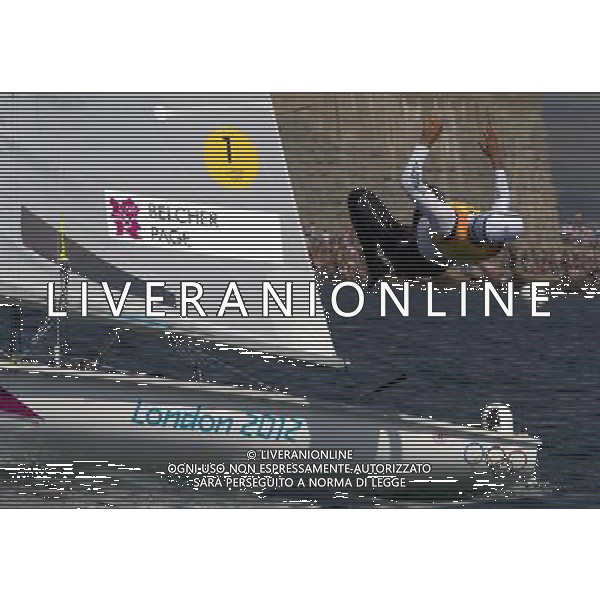 (120810) -- WEYMOUTH, Aug. 10, 2012 () -- Mathew Belcher of Australia celebrates after competing in 470 men competition of sailing event, at London 2012 Olympic Games in Weymouth and Portland, Britain, August 10, 2012. Mathew Belcher/Malcolm Page of Australia won gold medal. (/Fei Moahua) (zgp) ITALY ONLY - GIOCHI OLIMPICI, OLIMPIADI LONDRA 2012