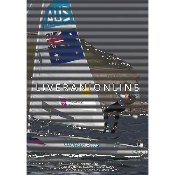 (120810) -- LONDON, Aug. 10, 2012 () -- Mathew Belcher of Australia celebrates after competing in 470 men competition of sailing event, at London 2012 Olympic Games in London, Britain, on August 10, 2012. Mathew Belcher/Malcolm Page of Australia won gold medal. (/Fei Moahua) (nxl) ITALY ONLY - GIOCHI OLIMPICI, OLIMPIADI LONDRA 2012