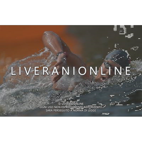 (120810) -- LONDON, Aug. 10, 2012 () -- Oussama Mellouli of Tunisia competes in men\'s swimming 10km marathon, at London 2012 Olympic Games in London, Britain, on August 10, 2012. Oussama Mellouli of Tunisia won gold medal. (/Chen Xiaowei) (nxl) ITALY ONLY - GIOCHI OLIMPICI, OLIMPIADI LONDRA 2012