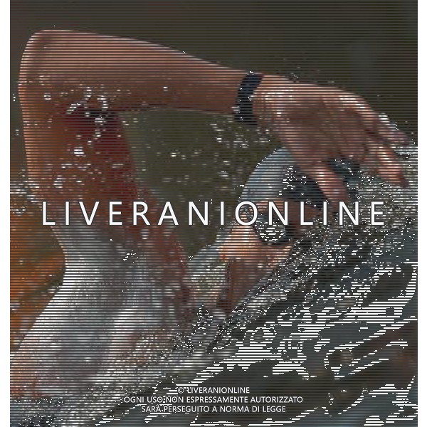 (120810) -- LONDON, Aug. 10, 2012 () -- Oussama Mellouli of Tunisia competes in men\'s swimming 10km marathon, at London 2012 Olympic Games in London, Britain, on August 10, 2012. Oussama Mellouli of Tunisia won gold medal. (/Chen Xiaowei) (nxl) ITALY ONLY - GIOCHI OLIMPICI, OLIMPIADI LONDRA 2012