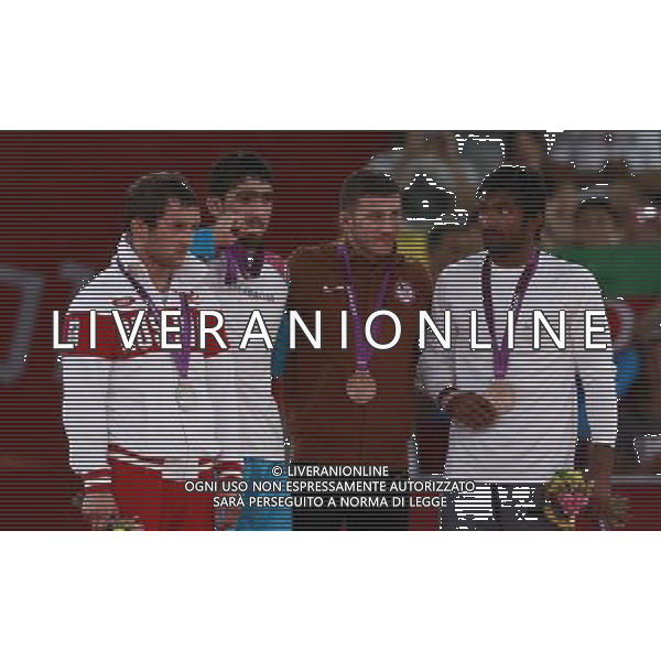 (120811) -- LONDON, Aug. 11, 2012 () -- Gold medalist Toghrul Asgarov of Azerbaijan (2nd L), silver medalist Besik Kudukhov of Russia (1st L), bronze medalists Coleman Scott of the United States (2nd R) and Yogeshwar Dutt of India pose at the awarding ceremony of Men\'s 60kg Freestyle of Wrestling at London 2012 Olympic Games, London, Britain, Aug. 11, 2012. (/Ren Zhenglai) ITALY ONLY - GIOCHI OLIMPICI, OLIMPIADI LONDRA 2012