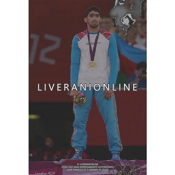 (120811) -- LONDON, Aug. 11, 2012 () -- Gold medalist Toghrul Asgarov of Azerbaijan attends victory ceremony of men\'s wrestling freestyle 60kg competition, at London 2012 Olympic Games in London, Britain, on August 11, 2012. (/Ren Zhenglai) (nxl) ITALY ONLY - GIOCHI OLIMPICI, OLIMPIADI LONDRA 2012
