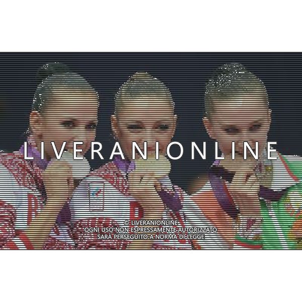 (120811) -- LONDON, Aug. 11, 2012 () -- Gold medalist Evgeniya Kanaeva (C) of Russia, silver medalist Daria Dmitrieva (L) of Russia and bronze medalist Liubou Charkashyna of Belarus pose at awarding ceremony of gymnastics rhythmic individual all-around event, at London 2012 Olympic Games in London, Britain, on August 11, 2012. (/Yang Zongyou)(zgp) ITALY ONLY - GIOCHI OLIMPICI, OLIMPIADI LONDRA 2012