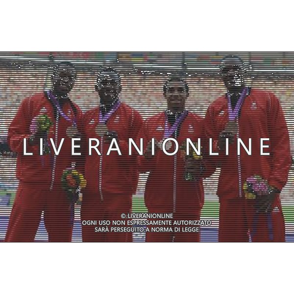 (120811) -- LONDON, Aug. 11, 2012 () -- Bronze medalists runners of Trinidad and Tobago pose at awarding ceremony of men\'s 4x400m relay at London 2012 Olympic Games, London, Britain, Aug. 11, 2012. (/Wang Jianhua)(zgp) ITALY ONLY - GIOCHI OLIMPICI, OLIMPIADI LONDRA 2012