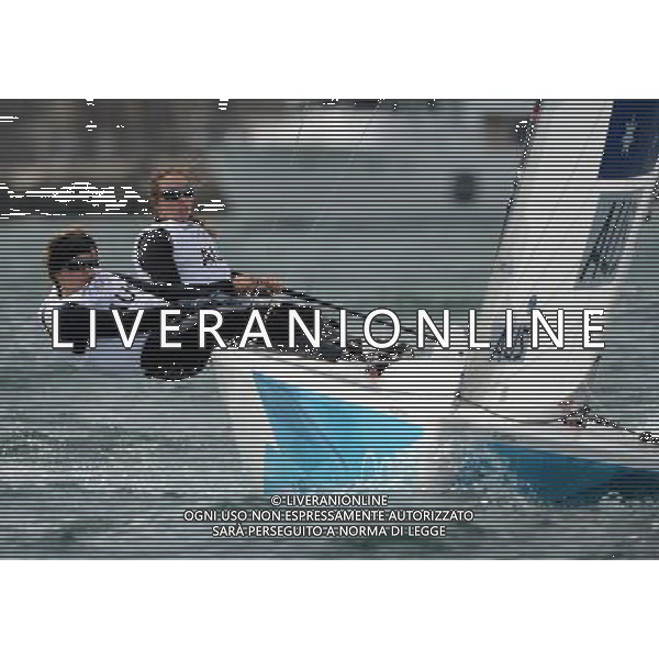 (120811) -- LONDON, Aug. 11, 2012 () -- Members of the Australian team compete during Elliott 6m WMR competition of Sailing event, at London 2012 Olympic Games in Britain, on August 11, 2012. The Australian team won silver medal. (/Zeng Yi) (nxl) ITALY ONLY - GIOCHI OLIMPICI, OLIMPIADI LONDRA 2012