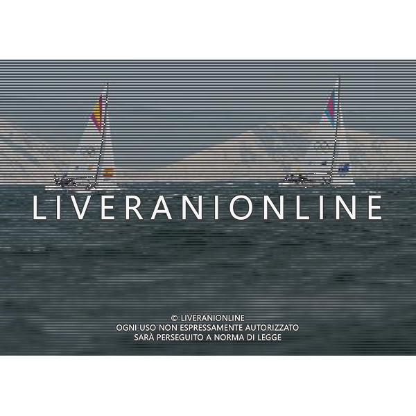 (120811) -- LONDON, Aug. 11, 2012 () -- The Spanish team competes with the Australian team during Elliott 6m WMR competition of Sailing event, at London 2012 Olympic Games in Britain, on August 11, 2012. The Spanish team won gold medal. (/Zeng Yi) (nxl) ITALY ONLY - GIOCHI OLIMPICI, OLIMPIADI LONDRA 2012