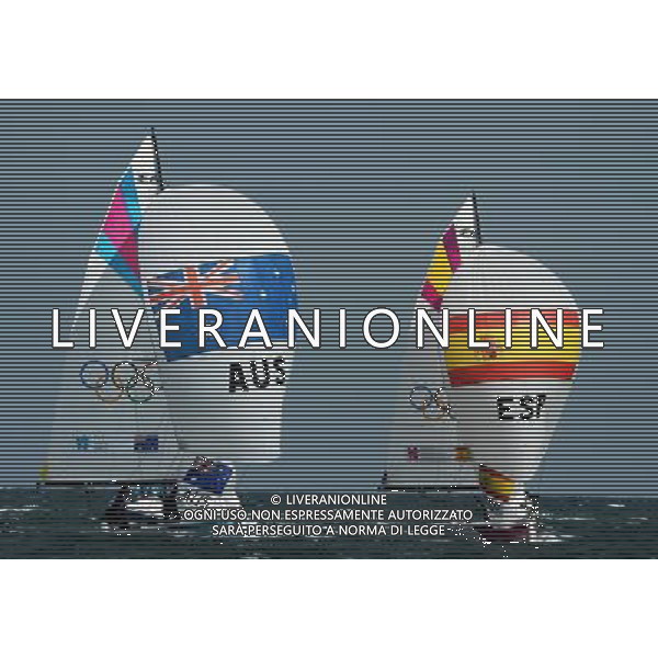 (120811) -- LONDON, Aug. 11, 2012 () -- The Spanish team competes with the Australian team during Elliott 6m WMR competition of Sailing event, at London 2012 Olympic Games in Britain, on August 11, 2012. The Spanish team won gold medal. (/Zeng Yi) (nxl) ITALY ONLY - GIOCHI OLIMPICI, OLIMPIADI LONDRA 2012