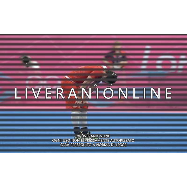 (120811) -- LONDON, Aug. 11, 2012 () -- James Tindall of Britain reacts after the bronze medal match of men\'s Hockey between Australia and Britain at London 2012 Olympic Games, London, Britain, Aug. 11, 2012. Australia won the match and claimed the bronze medal of the event. (/Wang Yuguo) ITALY ONLY - GIOCHI OLIMPICI, OLIMPIADI LONDRA 2012