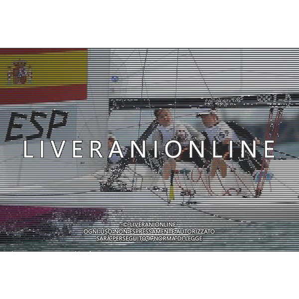 (120811) -- LONDON, Aug. 11, 2012 () -- The Spanish team competes in Elliott 6m WMR competition of Sailing event, at London 2012 Olympic Games in Britain, on August 11, 2012. The Spanish team won gold medal. (/Zeng Yi) (nxl) ITALY ONLY - GIOCHI OLIMPICI, OLIMPIADI LONDRA 2012