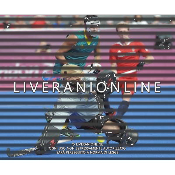 (120811) -- LONDON, Aug. 11, 2012 () -- Australian goalkeeper Nathan Burgers dives for the ball during the bronze medal match of men\'s Hockey between Australia and Britain at London 2012 Olympic Games, London, Britain, Aug. 11, 2012. Australia won the match and claimed the bronze medal of the event. (/Wang Yuguo) ITALY ONLY - GIOCHI OLIMPICI, OLIMPIADI LONDRA 2012