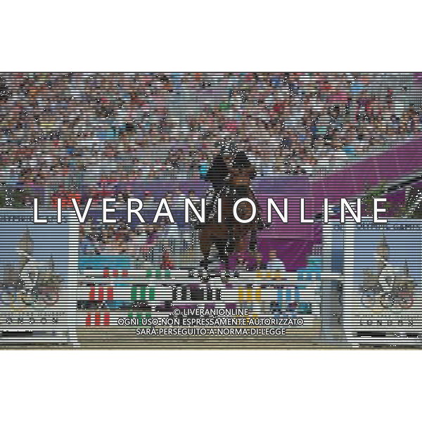 (120811) -- LONDON, Aug. 11, 2012 () -- Cao Zhongrong of China takes part in men\'s Modern Pentathlon riding competition, at London 2012 Olympic Games in London, Britain, on August 11, 2012. Cao Zhongrong of China currently ranks 2nd with an overall score of 3456. (/Liu Dawei) (nxl) ITALY ONLY - GIOCHI OLIMPICI, OLIMPIADI LONDRA 2012