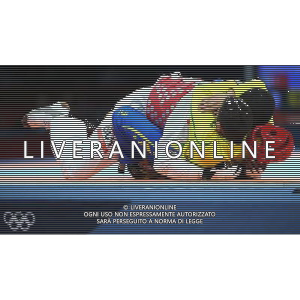 (120811) -- LONDON, Aug. 11, 2012 () -- Anthony Obame of Gabon hugs his coach after defeating Bahri Tanrikulu of Turkey in men\'s Taekwondo +80kg semifinal match, at London 2012 Olympic Games in London, Britain, on August 11, 2012. (/Wang Lili) (nxl) ITALY ONLY - GIOCHI OLIMPICI, OLIMPIADI LONDRA 2012