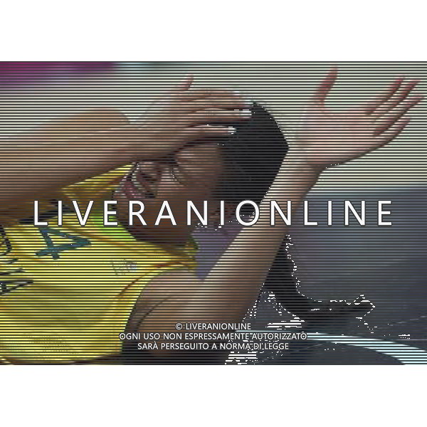 (120811) -- LONDON, Aug. 11, 2012 () -- Australian center Elizabeth Cambage falls to the ground during the women\'s basketball bronze medal match between Australia and Russia at London 2012 Olympic Games, London, Britain, Aug. 11, 2012. (/Meng Yongmin) ITALY ONLY - GIOCHI OLIMPICI, OLIMPIADI LONDRA 2012