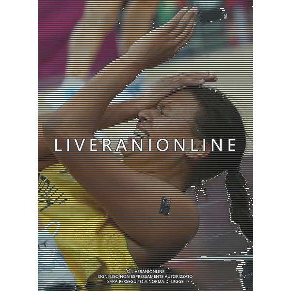 (120811) -- LONDON, Aug. 11, 2012 () -- Australian center Elizabeth Cambage falls to the ground during the women\'s basketball bronze medal match between Australia and Russia at London 2012 Olympic Games, London, Britain, Aug. 11, 2012. (/Meng Yongmin) ITALY ONLY - GIOCHI OLIMPICI, OLIMPIADI LONDRA 2012