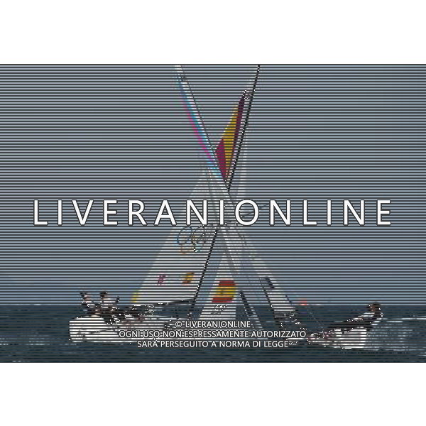 11.08.2012. Weymouth, Dorset, England. Members of The Spanish team Competes with The Australian team during Elliott 6m Competition of sailing Event London 2012 Olympic Games The Spanish team Won Gold Medal ITALY ONLY - GIOCHI OLIMPICI, OLIMPIADI LONDRA 2012