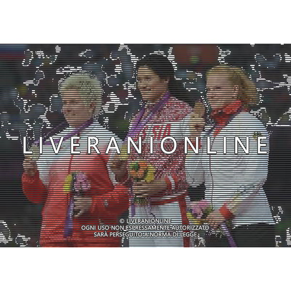 (120811) -- LONDON, Aug. 11, 2012 () -- Gold medalist Tatyana Lysenko (C) of Russia, silver medalist Anita Wlodarczyk (L) of Poland, bronze medalist Betty Heidler of Germany pose at awarding ceremony of women\'s hammer throw final at London 2012 Olympic Games, London, Britain, Aug. 11, 2012.(/Wang Jianhua)(zgp) ITALY ONLY - GIOCHI OLIMPICI, OLIMPIADI LONDRA 2012