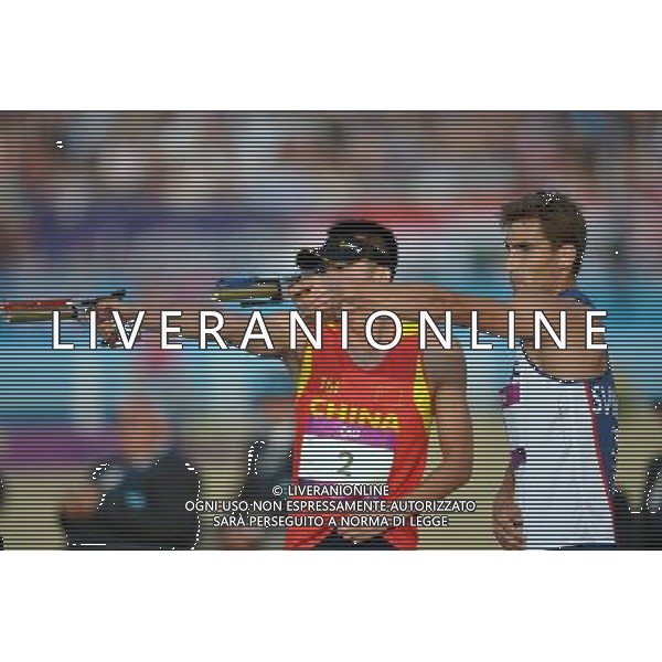 (120811) -- LONDON, Aug. 11, 2012 () -- David Svoboda of Czech Republic (R) and Cao Zhongrong of China compete in men\'s Modern Pentathlon combined competition, at London 2012 Olympic Games in London, Britain, on August 11, 2012. David Svoboda of Czech Republic won gold medal. (/Liu Dawei) (nxl) ITALY ONLY - GIOCHI OLIMPICI, OLIMPIADI LONDRA 2012