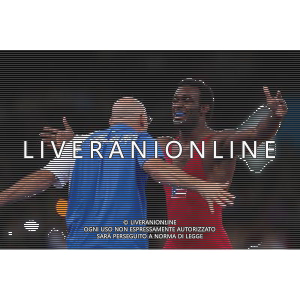 (120811) -- LONDON, Aug. 11, 2012 () -- Jaime Yusept Espinal of Puerto Rico (in red) celebrates after defeating Soslan Gattsiev of Belarus during men\'s wrestling freestyle 84kg semifinal match, at London 2012 Olympic Games in London, Britain, on August 11, 2012. Jaime Yusept Espinal of Puerto Rico won. (/Jin Liwang) (nxl) ©PHOTOSHOT/Agenzia Aldo Liverani Sas - ITALY ONLY - GIOCHI OLIMPICI, OLIMPIADI LONDRA 2012