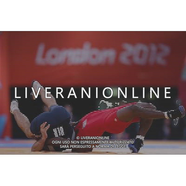 (120811) -- LONDON, Aug. 11, 2012 () -- Jaime Yusept Espinal of Puerto Rico (in red) competes with Soslan Gattsiev of Belarus during men\'s wrestling freestyle 84kg semifinal match, at London 2012 Olympic Games in London, Britain, on August 11, 2012. Jaime Yusept Espinal of Puerto Rico won. (/Jin Liwang) (nxl) ©PHOTOSHOT/Agenzia Aldo Liverani Sas - ITALY ONLY - GIOCHI OLIMPICI, OLIMPIADI LONDRA 2012