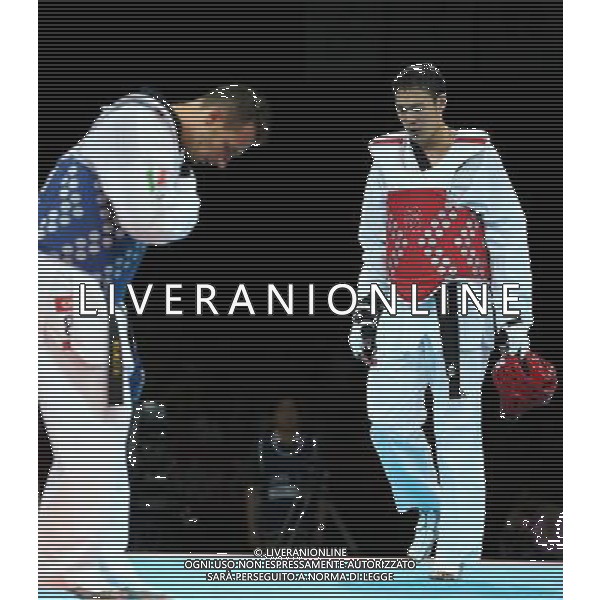 (120811) -- LONDON, Aug. 11, 2012 () -- Liu Xiaobo of China (in red) competes with Carlo Molfetta of Italy during men\'s taekwondo +80kg quarterfinal match, at London 2012 Olympic Games in London, Britain, on August 11, 2012. Carlo Molfetta of Italy won. (/Wang Lili) (nxl) ©PHOTOSHOT/Agenzia Aldo Liverani Sas - ITALY ONLY - GIOCHI OLIMPICI, OLIMPIADI LONDRA 2012