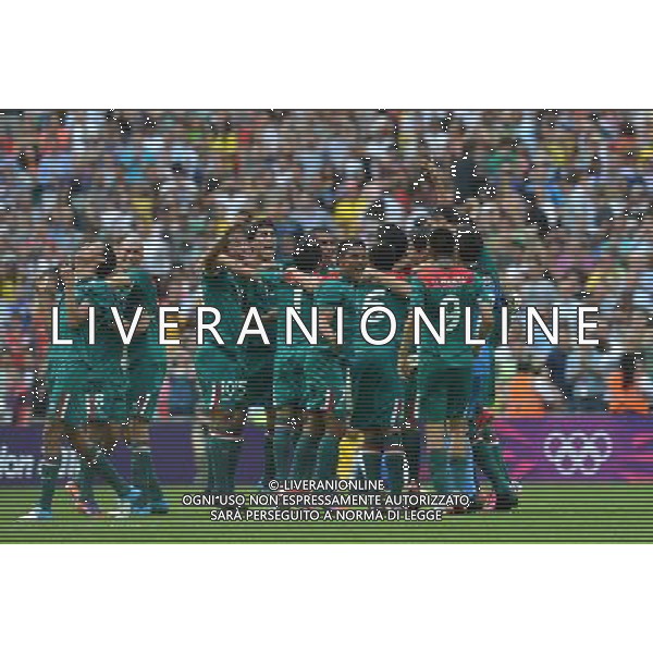 (120811) -- LONDON, Aug. 11, 2012 () -- Mexican players celebrate after men\'s football gold medal match between Brazil and Mexico, at London 2012 Olympic Games in London, Britain, on August 11, 2012. Mexico won the match 2-1 and won gold medal. (/Gong Lei) (zgp) ©PHOTOSHOT/Agenzia Aldo Liverani Sas - ITALY ONLY - GIOCHI OLIMPICI, OLIMPIADI LONDRA 2012