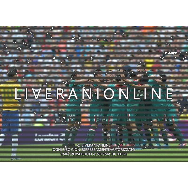 (120811) -- LONDON, Aug. 11, 2012 () -- Mexican players celerbate after men\'s football gold medal match between Brazil and Mexico, at London 2012 Olympic Games in London, Britain, on August 11, 2012. Mexico won the match 2-1 and won gold medal. (/Gong Lei) (zgp) ©PHOTOSHOT/Agenzia Aldo Liverani Sas - ITALY ONLY - GIOCHI OLIMPICI, OLIMPIADI LONDRA 2012