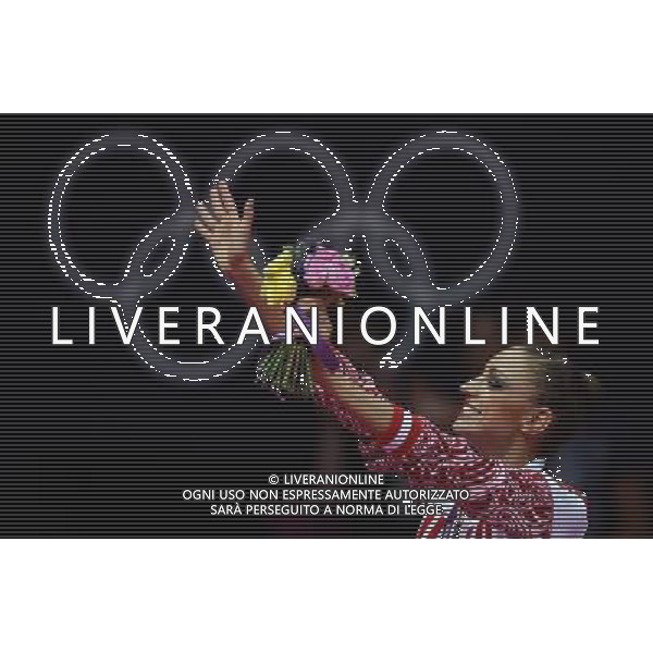 (120811) -- LONDON, Aug. 11, 2012 () -- Evgeniya Kanaeva of Russia waves to spectators at awarding ceremony of gymnastics rhythmic individual all-around event, at London 2012 Olympic Games in London, Britain, on August 11, 2012. Evgeniya Kanaeva of Russia won gold medal with 116.900. (/Tao Xiyi)(zgp) ©PHOTOSHOT/Agenzia Aldo Liverani Sas - ITALY ONLY - GIOCHI OLIMPICI, OLIMPIADI LONDRA 2012