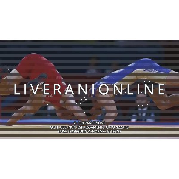 (120811) -- LONDON, Aug. 11, 2012 () -- Besik Kudukhov of Russia (blue) competes with Ri Jong Myong of the Democratic People\'s Republic of Korea (DPRK) during the Men\'s 60kg Freestyle of Wrestling at London 2012 Olympic Games, London, Britain, Aug. 11, 2012. Besik Kudukhov of Russia won the match and advanced to final. (/Ren Zhenglai) ©PHOTOSHOT/Agenzia Aldo Liverani Sas - ITALY ONLY - GIOCHI OLIMPICI, OLIMPIADI LONDRA 2012