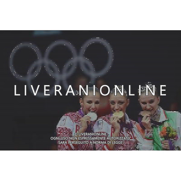 (120811) -- LONDON, Aug. 11, 2012 () -- Gold medalist Evgeniya Kanaeva (C) of Russia, silver medalist Daria Dmitrieva (L) of Russia and bronze medalist Liubou Charkashyna of Belarus pose at awarding ceremony of gymnastics rhythmic individual all-around event, at London 2012 Olympic Games in London, Britain, on August 11, 2012. (/Tao Xiyi)(zgp) ©PHOTOSHOT/Agenzia Aldo Liverani Sas - ITALY ONLY - GIOCHI OLIMPICI, OLIMPIADI LONDRA 2012