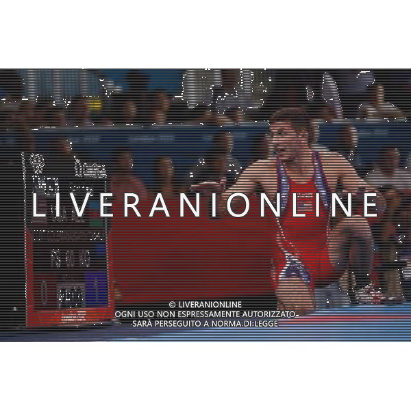 (120811) -- LONDON, Aug. 11, 2012 () -- Coleman Scott of the United States argues during the Men\'s 60kg Freestyle semifinal of Wrestling against Toghrul Asgarov of Azerbaijan at London 2012 Olympic Games, London, Britain, Aug. 11, 2012. Toghrul Asgarov of Azerbaijan won the match and advanced to final. (/Jin Liwang) ©PHOTOSHOT/Agenzia Aldo Liverani Sas - ITALY ONLY - GIOCHI OLIMPICI, OLIMPIADI LONDRA 2012