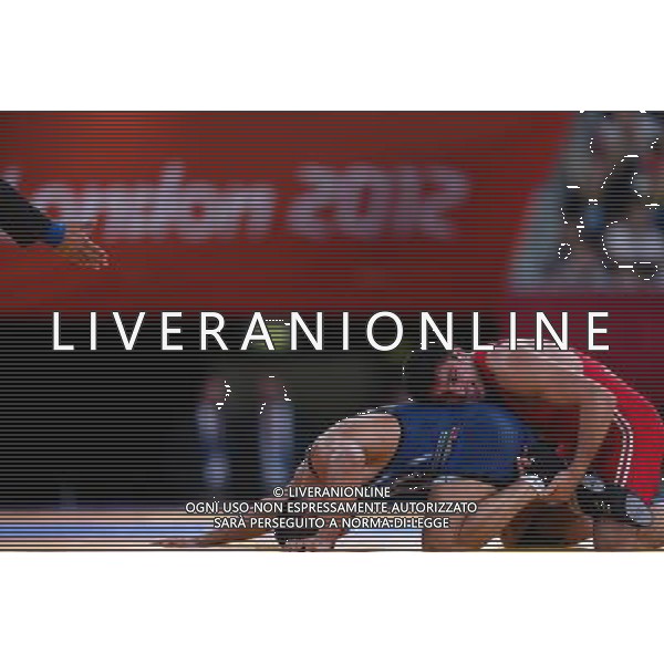 (120811) -- LONDON, Aug. 11, 2012 () -- Sharif Sharifov of Azerbaijan (in red) competes with Ehsan Naser Lashgari of Iran during men\'s wrestling freestyle 84kg semifinal match, at London 2012 Olympic Games in London, Britain, on August 11, 2012. Sharif Sharifov of Azerbaijan won. (/Jin Liwang) (nxl) ©PHOTOSHOT/Agenzia Aldo Liverani Sas - ITALY ONLY - GIOCHI OLIMPICI, OLIMPIADI LONDRA 2012