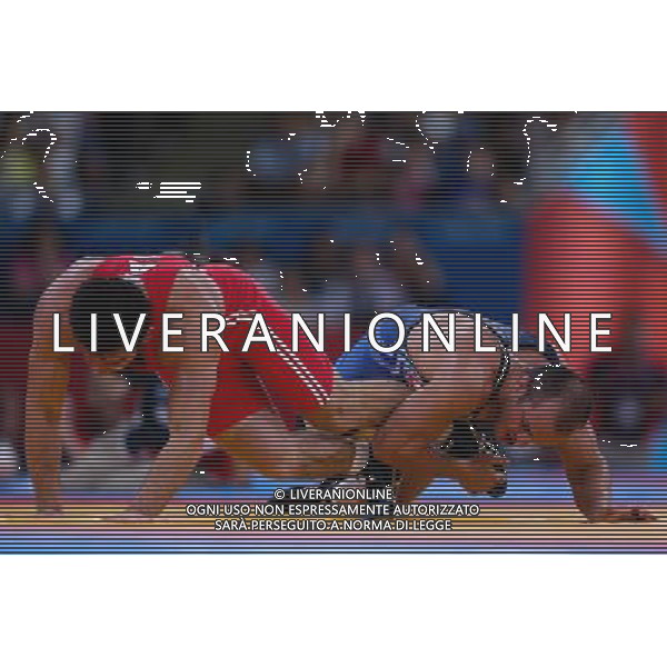 (120811) -- LONDON, Aug. 11, 2012 () -- Sharif Sharifov of Azerbaijan (in red) competes with Ehsan Naser Lashgari of Iran during men\'s wrestling freestyle 84kg semifinal match, at London 2012 Olympic Games in London, Britain, on August 11, 2012. Sharif Sharifov of Azerbaijan won. (/Jin Liwang) (nxl) ©PHOTOSHOT/Agenzia Aldo Liverani Sas - ITALY ONLY - GIOCHI OLIMPICI, OLIMPIADI LONDRA 2012