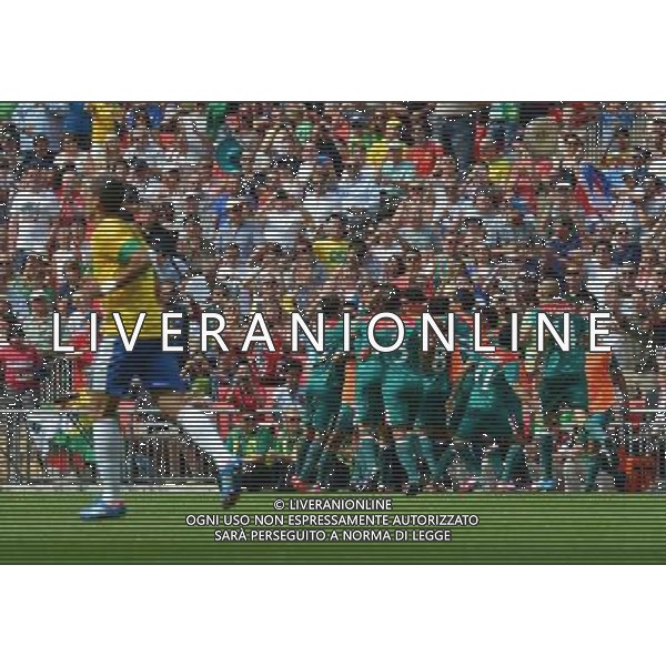 (120811) -- LONDON, Aug. 11, 2012 () -- Mexican players celebrate after scoring a goal during men\'s football gold medal match between Brazil and Mexico, at London 2012 Olympic Games in London, Britain, on August 11, 2012. (/Gong Lei) (nxl) ©PHOTOSHOT/Agenzia Aldo Liverani Sas - ITALY ONLY - GIOCHI OLIMPICI, OLIMPIADI LONDRA 2012