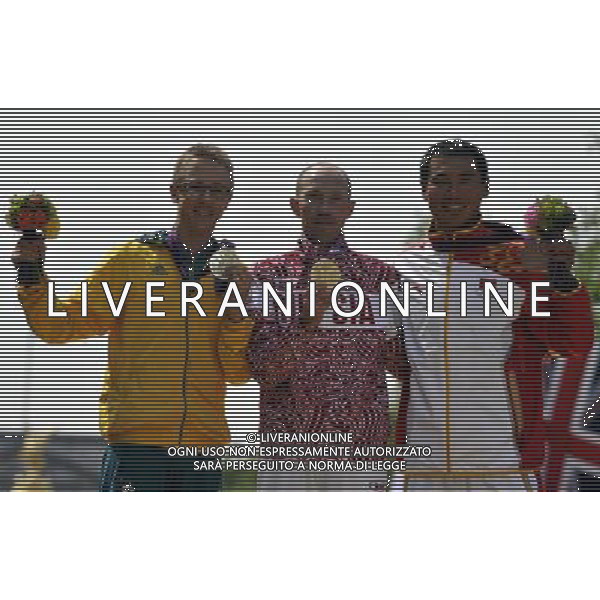 (120811) -- LONDON, Aug. 11, 2012 () -- Gold medalist Sergey Kirdyapkin of Russia (C), silver medalist Jared Tallent of Australia (L) and bronze medalist Si Tianfeng of China attend victory ceremony of men\'s 50km race walk contest, at London 2012 Olympic Games in London, Britain, on August 11, 2012. (/Gesang Dawa) (nxl) ©PHOTOSHOT/Agenzia Aldo Liverani Sas - ITALY ONLY - GIOCHI OLIMPICI, OLIMPIADI LONDRA 2012