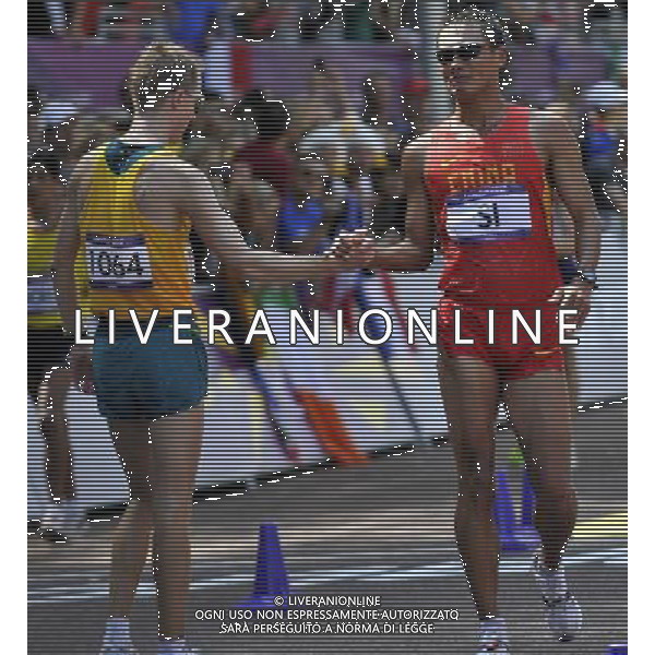 (120811) -- LONDON, Aug. 11, 2012 () -- Bronze medalist Si Tianfeng of China interacts with silver medalist Jared Tallent of Australia after men\'s 50km race walk contest, at London 2012 Olympic Games in London, Britain, on August 11, 2012. (/Gesang Dawa) (nxl) ©PHOTOSHOT/Agenzia Aldo Liverani Sas - ITALY ONLY - GIOCHI OLIMPICI, OLIMPIADI LONDRA 2012