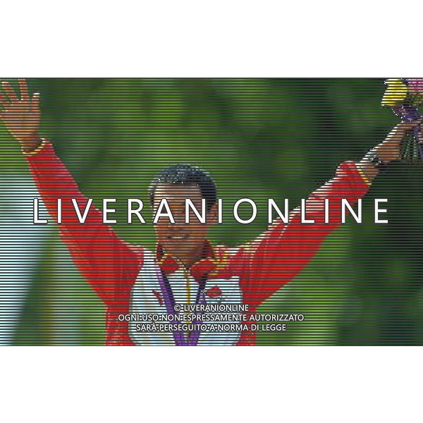 (120811) -- LONDON, Aug. 11, 2012 () -- Si Tianfeng of China celebrates during victory ceremony of men\'s 50km race walk contest, at London 2012 Olympic Games in London, Britain, on August 11, 2012. Si Tianfeng of China won bronze medal. (/Gesang Dawa) (nxl) ©PHOTOSHOT/Agenzia Aldo Liverani Sas - ITALY ONLY - GIOCHI OLIMPICI, OLIMPIADI LONDRA 2012