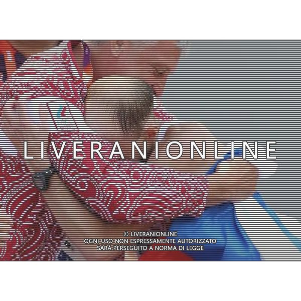 (120811) -- LONDON, Aug. 11, 2012 () -- Sergey Kirdyapkin of Russia celebrates with his coach after competing in men\'s 50km race walk contest, at London 2012 Olympic Games in London, Britain, on August 11, 2012. Sergey Kirdyapkin of Russia won gold medal. (/Yin Gang) (nxl) ©PHOTOSHOT/Agenzia Aldo Liverani Sas - ITALY ONLY - GIOCHI OLIMPICI, OLIMPIADI LONDRA 2012