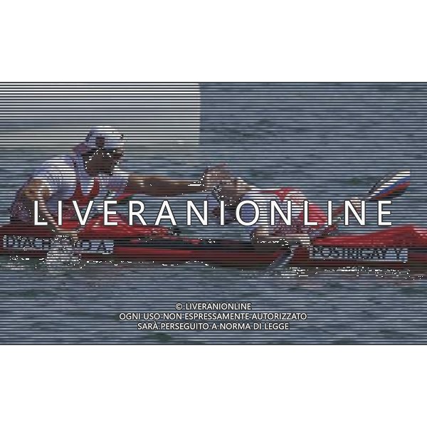 (120811) -- LONDON, Aug. 11, 2012 () -- Yury Postrigay and Alexander Dyachenko of Russia celebrate after competing in men\'s kayak double (K2) 200m competition of Canoe Sprint event, at London 2012 Olympic Games in London, Britain, on August 11, 2012. Yury Postrigay and Alexander Dyachenko of Russia won gold medal. (/Shen Bohan) (nxl) ©PHOTOSHOT/Agenzia Aldo Liverani Sas - ITALY ONLY - GIOCHI OLIMPICI, OLIMPIADI LONDRA 2012