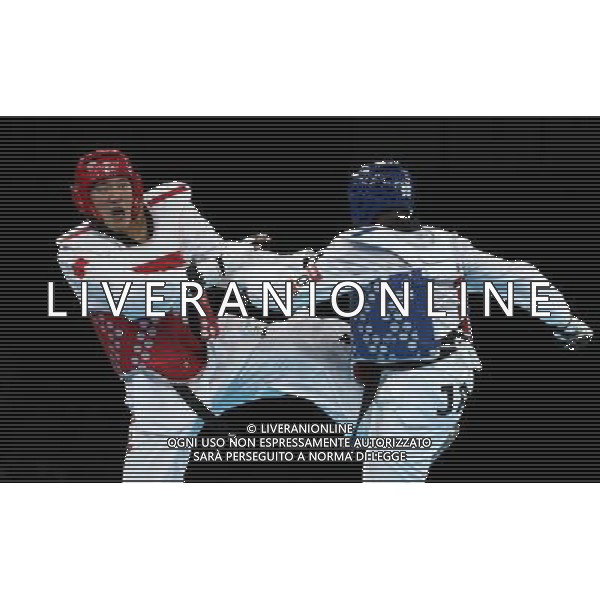 (120811) -- LONDON, Aug. 11, 2012 () -- Liu Xiaobo of China (red) competes with Kenneth Edwards of Jamaica during men\'s Taekwondo +80kg preliminary round match, at London 2012 Olympic Games in London, Britain, on August 11, 2012. Liu Xiaobo of China won. (/Wang Lili) (nxl) ©PHOTOSHOT/Agenzia Aldo Liverani Sas - ITALY ONLY - GIOCHI OLIMPICI, OLIMPIADI LONDRA 2012