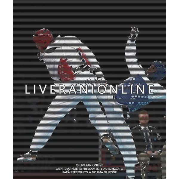 (120811) -- LONDON, Aug. 11, 2012 () -- Liu Xiaobo of China (red) competes with Kenneth Edwards of Jamaica during men\'s Taekwondo +80kg preliminary round match, at London 2012 Olympic Games in London, Britain, on August 11, 2012. Liu Xiaobo of China won. (/Wang Lili) (nxl) ©PHOTOSHOT/Agenzia Aldo Liverani Sas - ITALY ONLY - GIOCHI OLIMPICI, OLIMPIADI LONDRA 2012