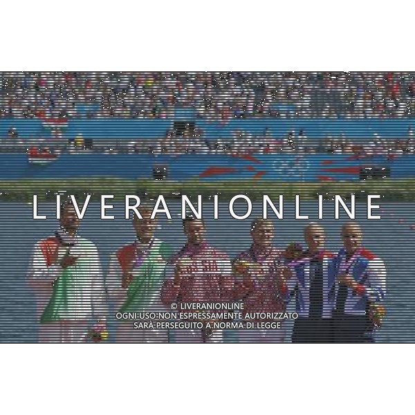 (120811) -- LONDON, Aug. 11, 2012 () -- Gold medalists Yury Postrigay and Alexander Dyachenko of Russia (C), silver medalists Raman Piatrushenka and Vadzim Makhneu of Belarus (L) and bronze medalists Liam Heath and Jon Schofielf of Britain attend victory ceremony of men\'s kayak double (K2) 200m competition of Canoe Sprint event, at London 2012 Olympic Games in London, Britain, on August 11, 2012. (/Shen Bohan) (nxl) ©PHOTOSHOT/Agenzia Aldo Liverani Sas - ITALY ONLY - GIOCHI OLIMPICI, OLIMPIADI LONDRA 2012