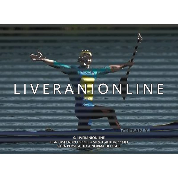 (120811) -- LONDON, Aug. 11, 2012 () -- Yuri Cheban of Ukraine celebrates after competing in men\'s canoe single (C1) 200m competition of Canoe Sprint event, at London 2012 Olympic Games in London, Britain, on August 11, 2012. Yuri Cheban of Ukraine won gold medal. (/Cheng Min) (nxl) ©PHOTOSHOT/Agenzia Aldo Liverani Sas - ITALY ONLY - GIOCHI OLIMPICI, OLIMPIADI LONDRA 2012